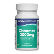 Frasco de suplemento con la etiqueta «Canela 2000mg Simply Supplements», de color verde sobre fondo blanco.