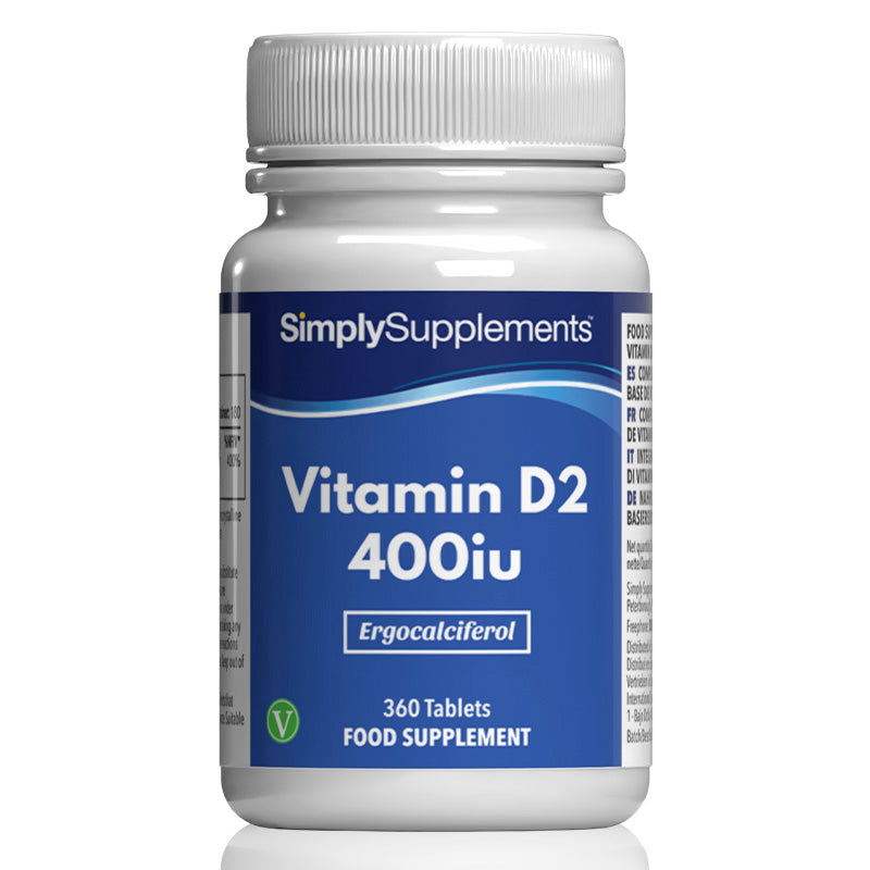 Frasco de suplemento con la etiqueta «Vitamina D 400iu Simply Supplements», de color azul sobre fondo blanco.