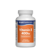 Frasco de suplemento con la etiqueta «Vitamina E 400iu Simply Supplements», de color naranja sobre fondo blanco.